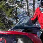 red snowmobile jumper