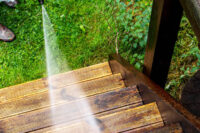Pressure washing dirty stairs